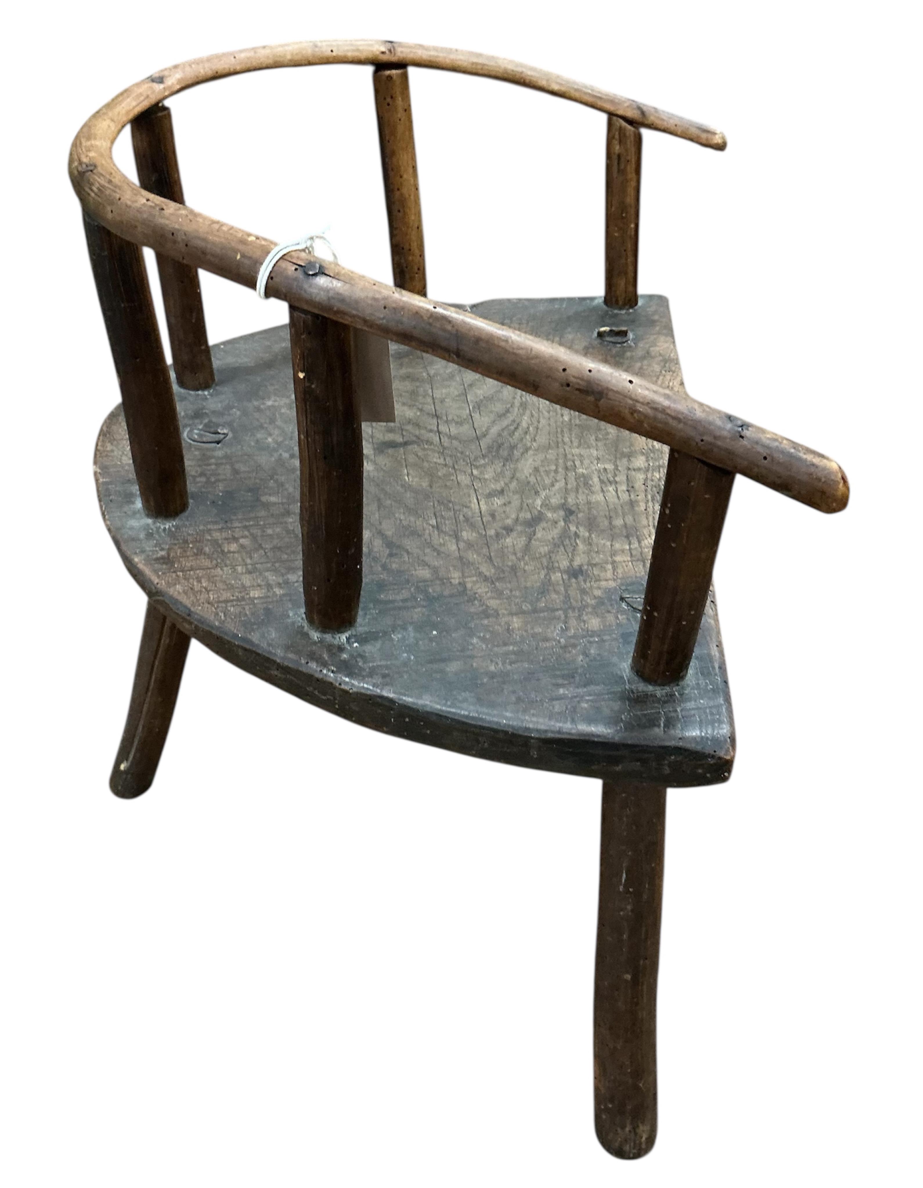 A 19th century elm and beech child's primitive chair, width 45cm, depth 32cm, height 45cm